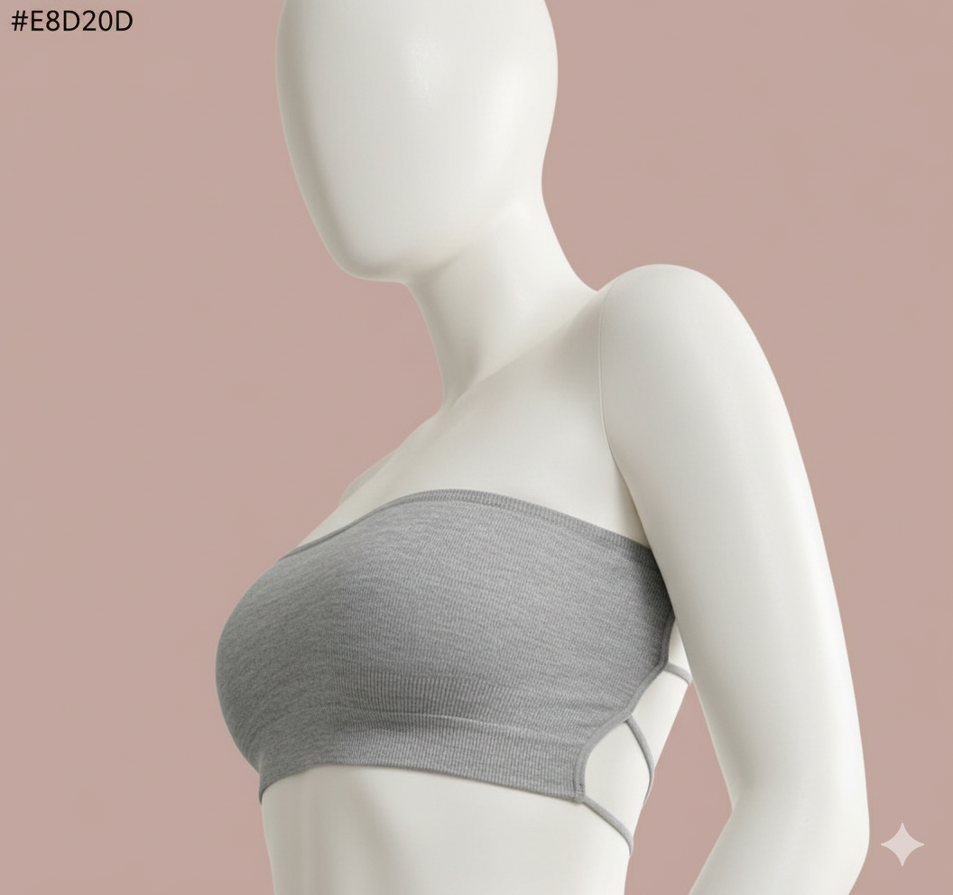 A versatile strapless bandeau bra top designed for smooth, invisible support. Features a comfortable seamless construction and an eye-catching multi-strap detail across the back, perfect for open-back outfits.