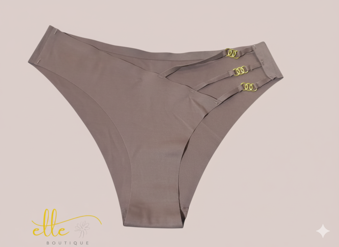This sophisticated, high-waist brief delivers an essential blend of invisibility and style. Crafted with advanced seamless technology, it guarantees a smooth silhouette free of visible lines. The design is subtly enhanced by decorative metal rings integrated into the side band, providing a luxurious, custom-fit appeal. This garment offers gentle shaping and exceptional all-day comfort, making it the perfect foundation piece for any modern wardrobe.