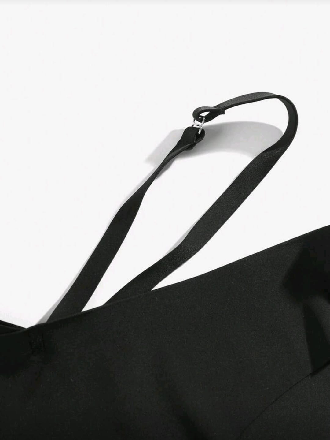 A modern and seductive panty featuring a comfortable seamless construction for invisibility under clothing. Enhanced with two sleek, crisscrossing straps at the waist/hips for an eye-catching, unique silhouette.