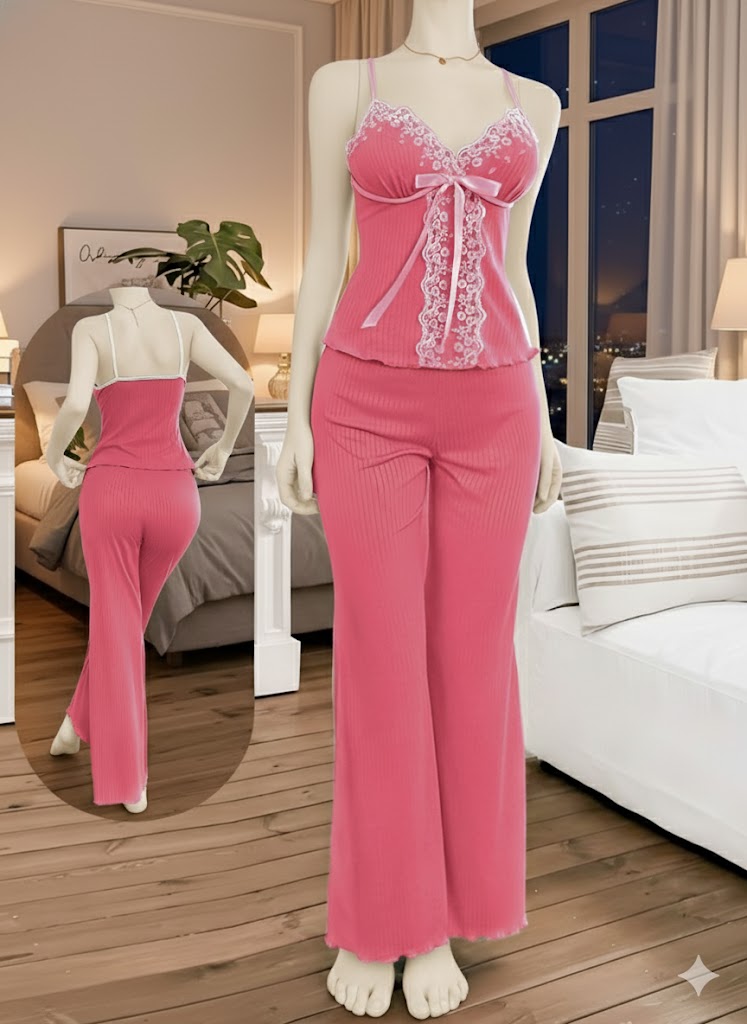 An exquisitely soft two-piece sleepwear set designed for comfort and feminine style. It features a delicate camisole top adorned with lace and ribbon details, paired with comfortable wide-leg pants crafted from a plush, ribbed fabric.