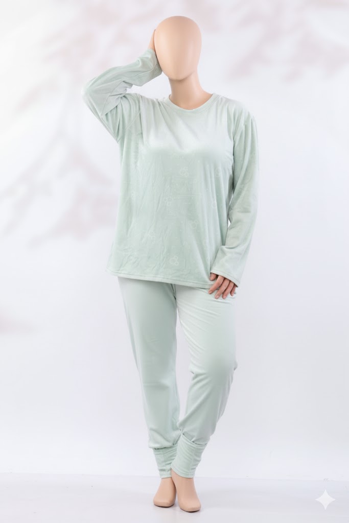 Embrace cozy comfort in this two-piece loungewear set designed for plus sizes. Made from premium imported double-sided velvet, this set features a plush, long-sleeve top and matching full-length pants, offering supreme softness and a comfortable fit for relaxing at home.