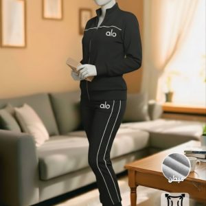 A sleek and comfortable white tracksuit for women, crafted from a warm cotton Lycra blend (Milton Cotton) with black stripe accents. This one-size set is perfect for casual outings, light activity, or relaxing at home.